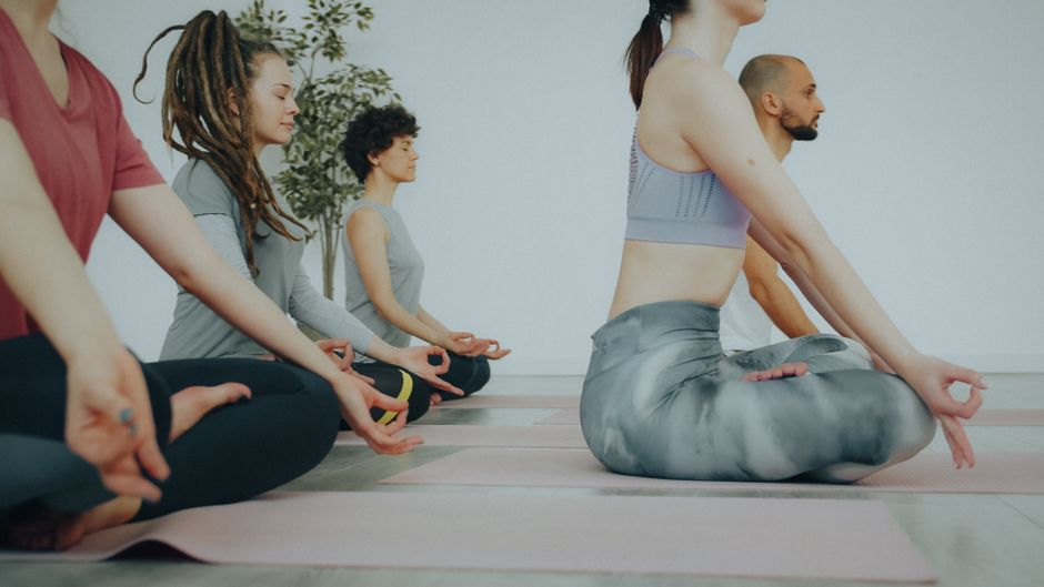 Students seated in a guided breathwork session.
